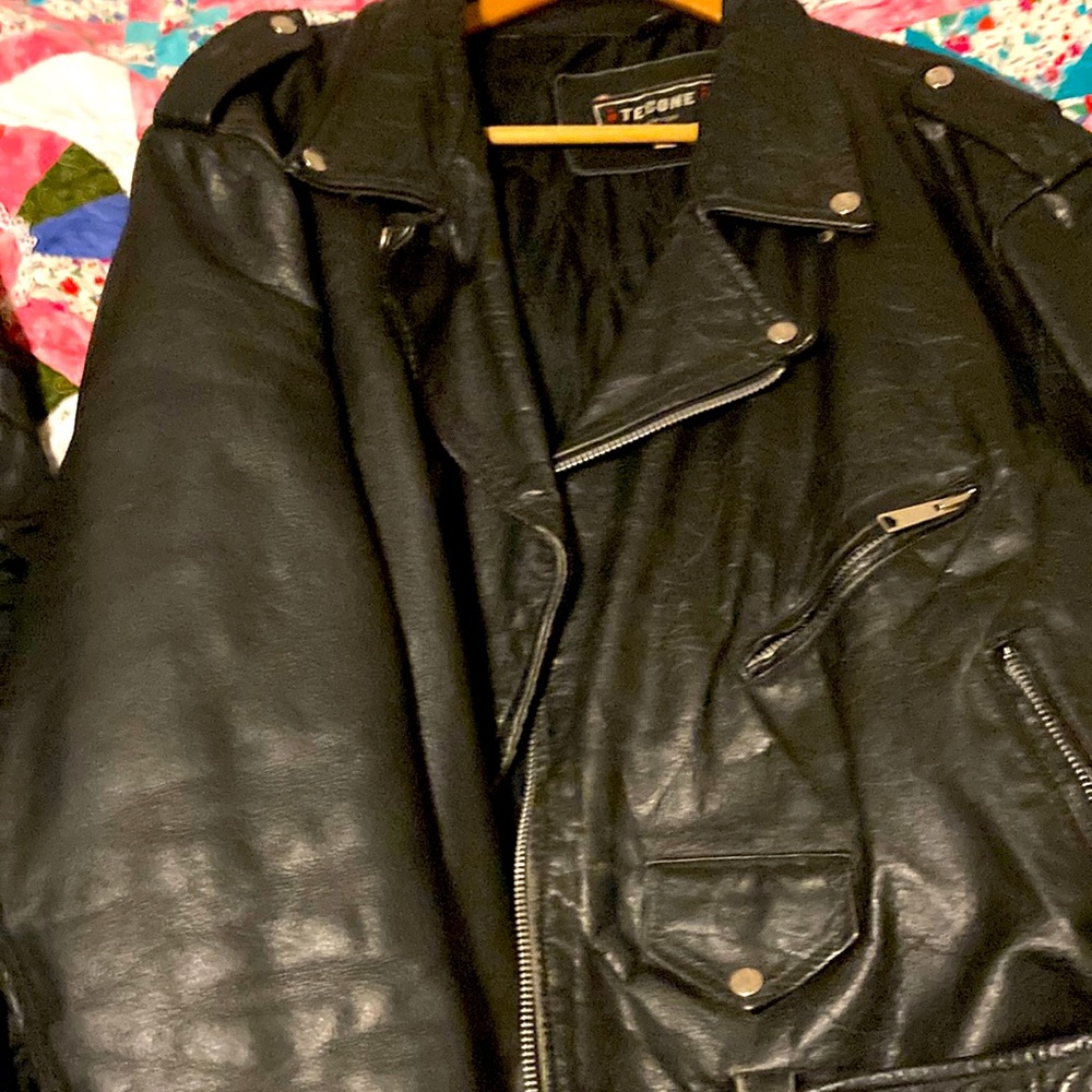 Leather biker jacket .